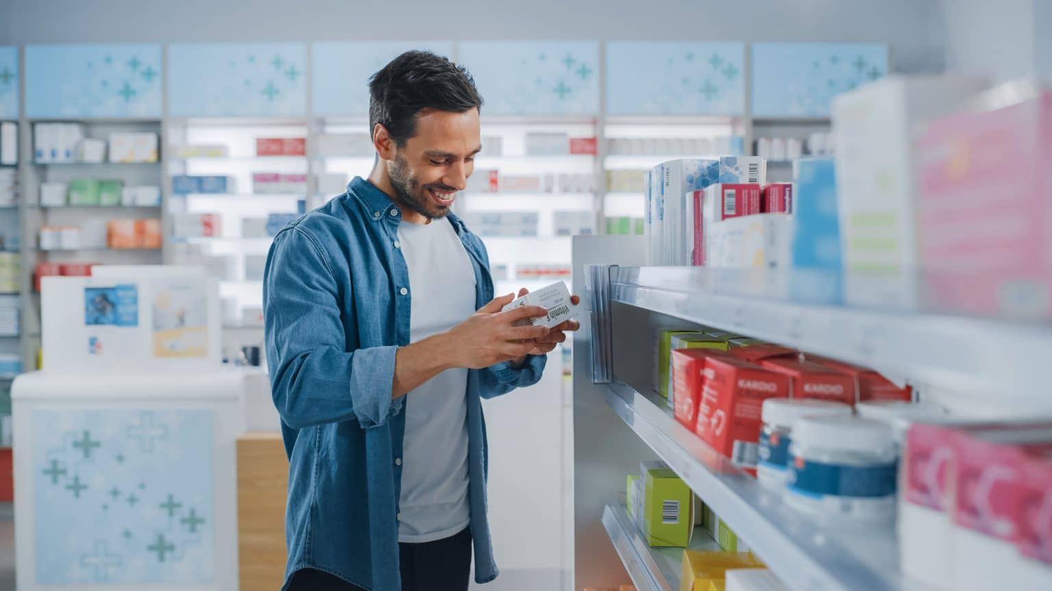 Man Suffering From Chronic Cough Man at the pharmacy getting medication for a cough