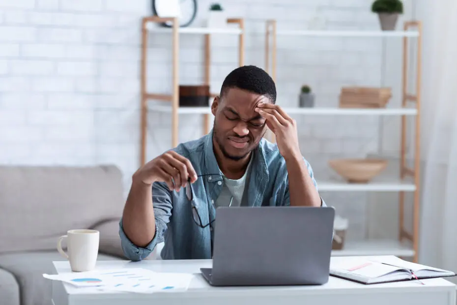 man with a sinus headache